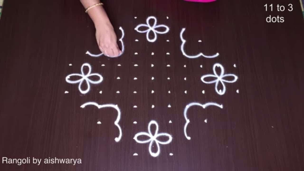 11 to 3 Flower Rangoli Designs