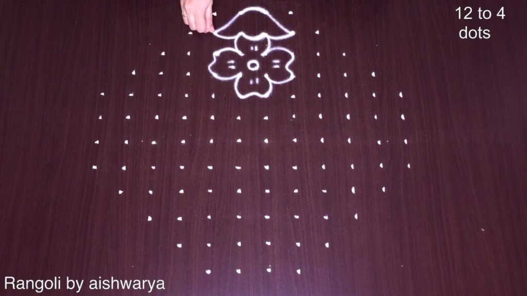 12-to-4 dot flower pot rangoli