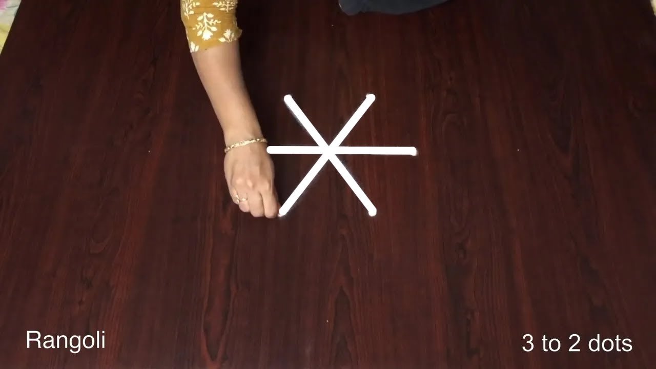 3 to 2 dots Flower Kolam