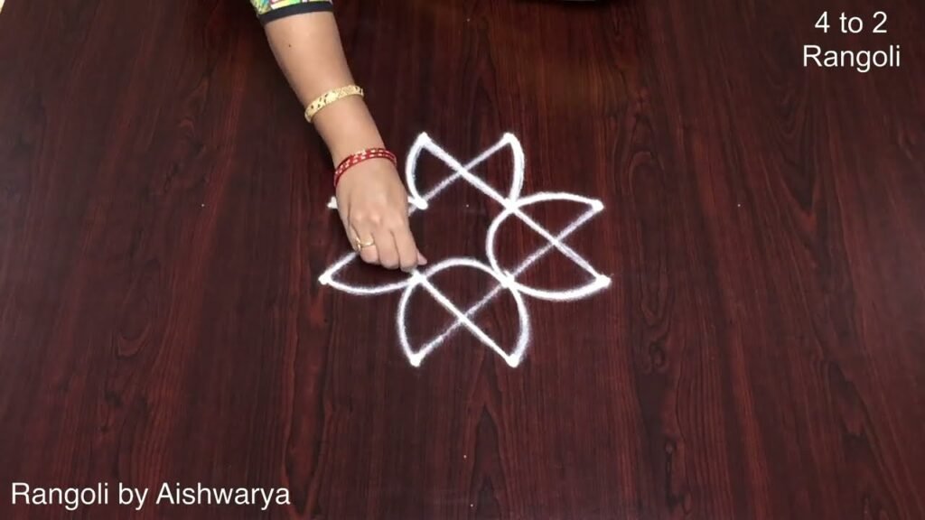 4 dots vilakku kolam