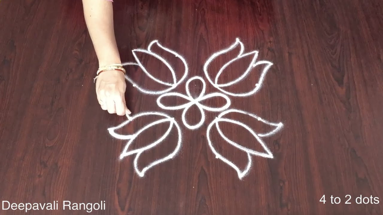 4 to 2 dots Apartment Kolam