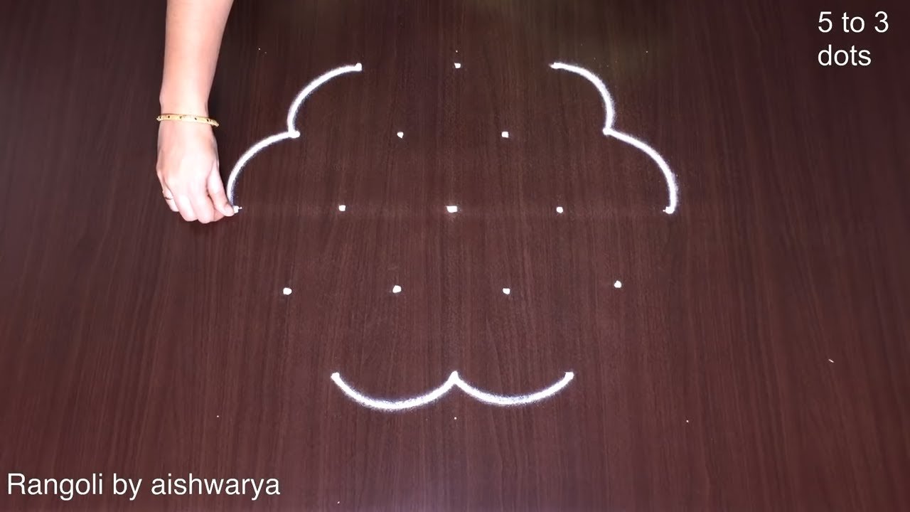 5 Into 3 Dots Vilakku Kolam Designs