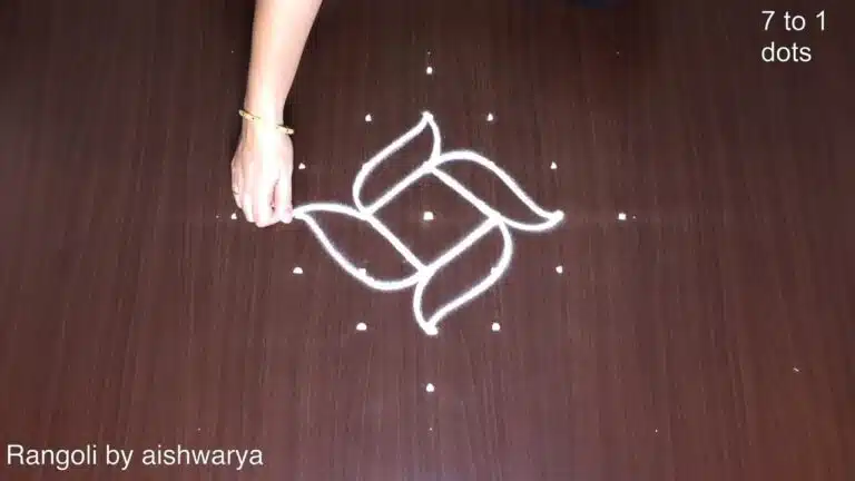 7 dots traditional peacock rangoli