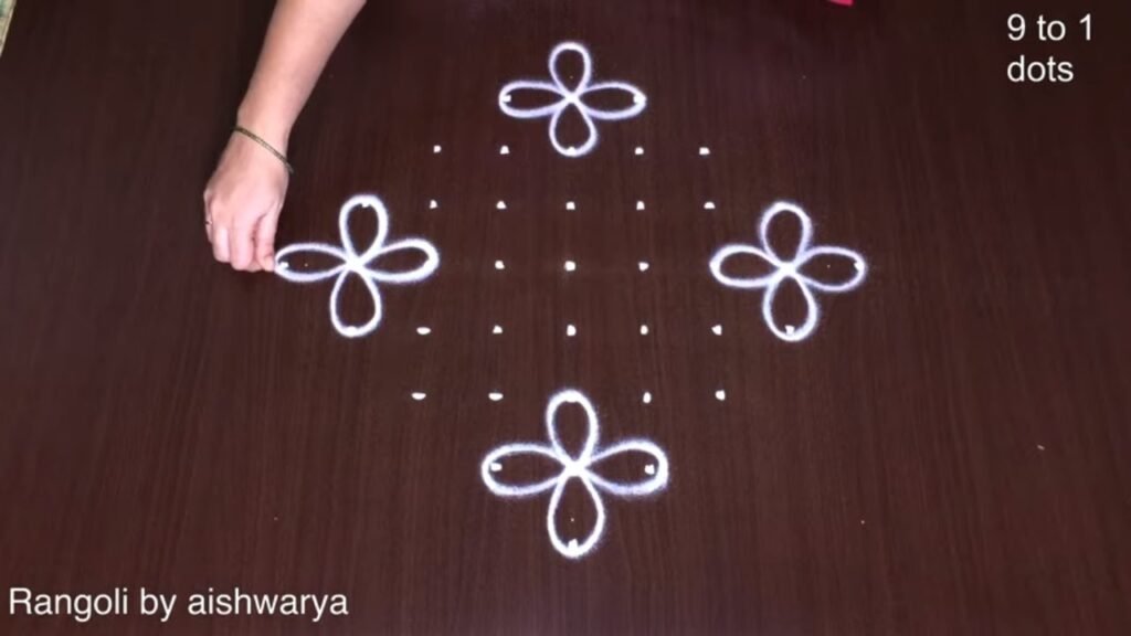 9×1 dots flower kolam