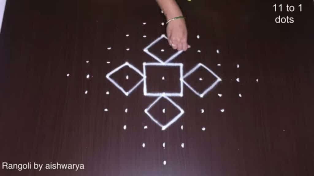 12 diyas rangoli