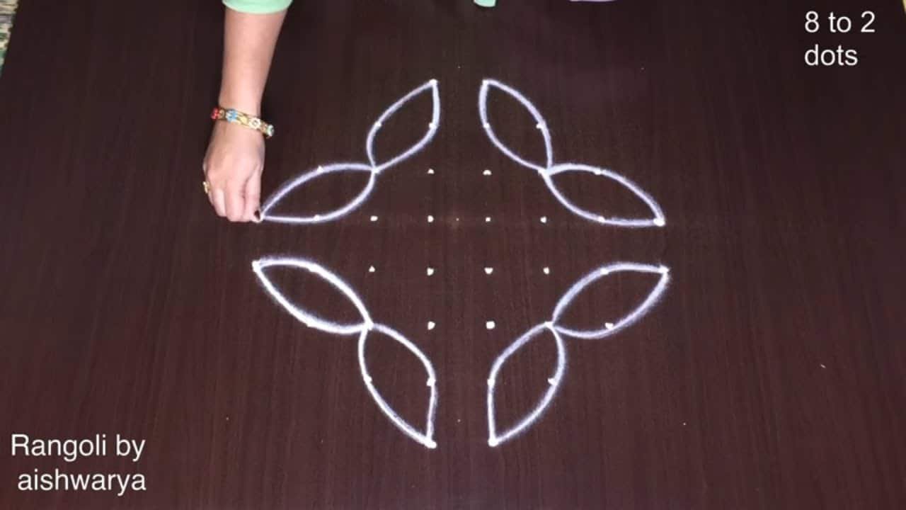 Amazing Flower Muggulu With 8