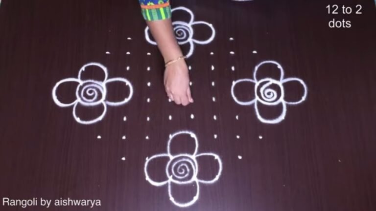 hand rangoli with diya