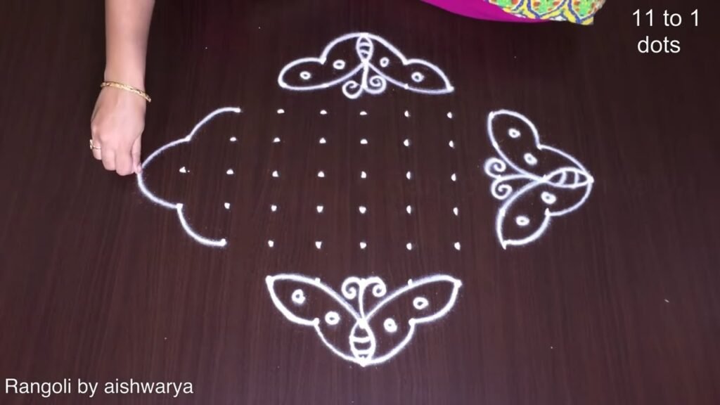 dotted butterfly rangoli