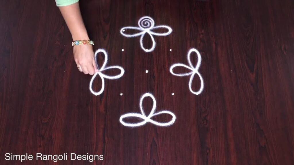 flower rangoli for Wednesday
