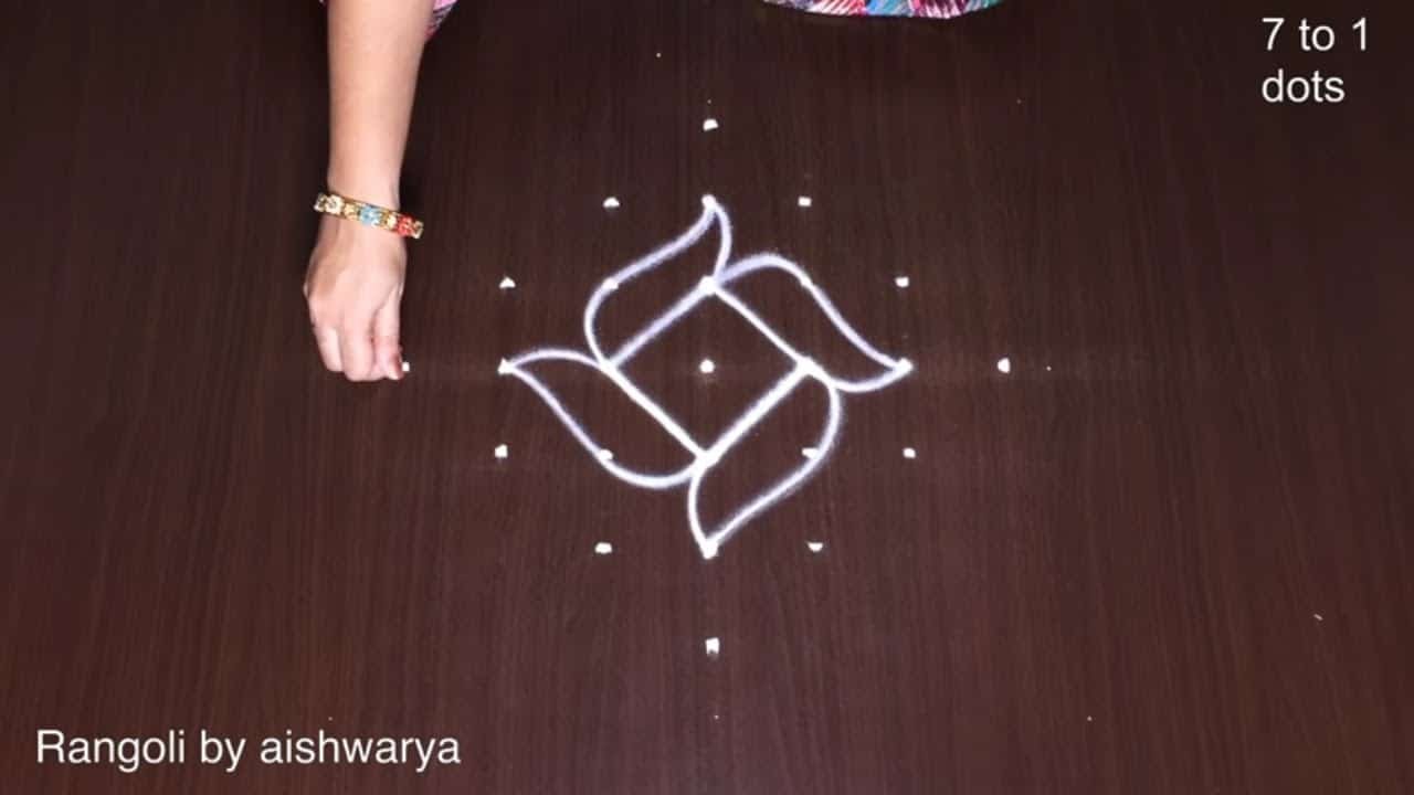 Beautiful Rangoli With 7×1 Dots