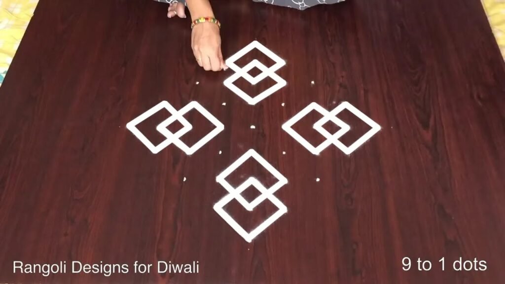 9-to-1 dot border rangoli