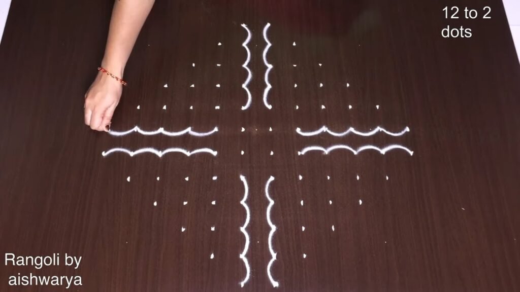 12×2 dots butterfly rangoli