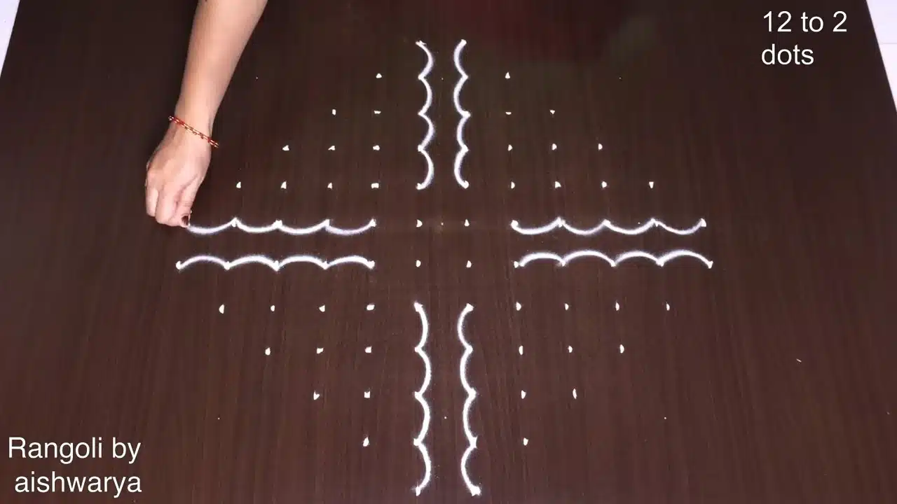 12×2 dots butterfly rangoli