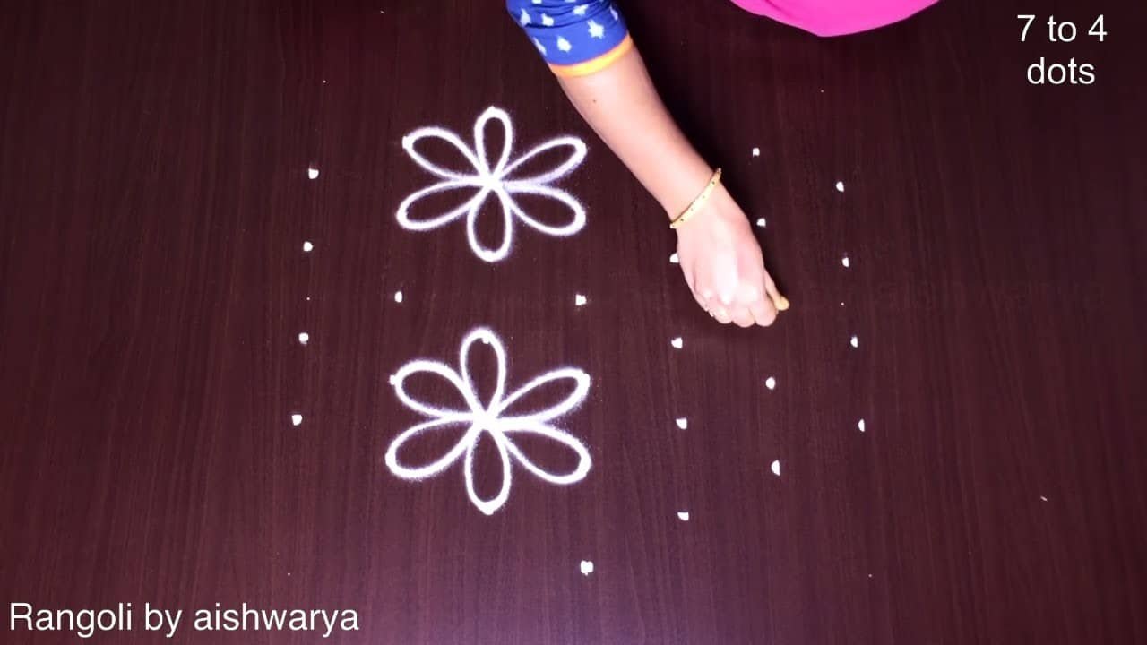 Cute Rangoli With 7 by 4
