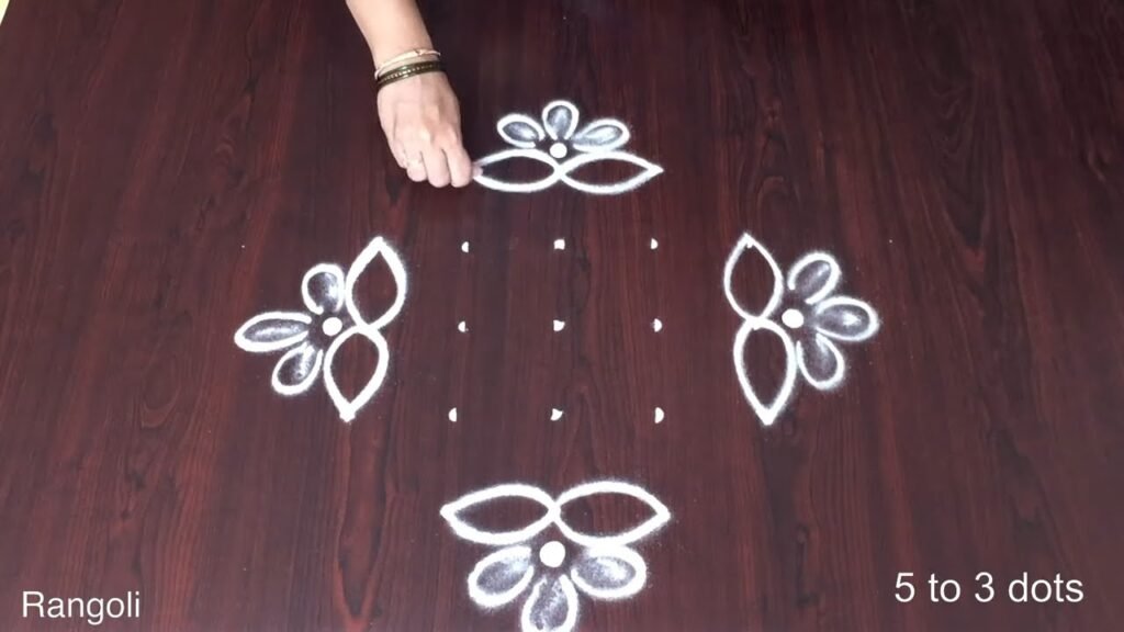 deepam rangoli with dots