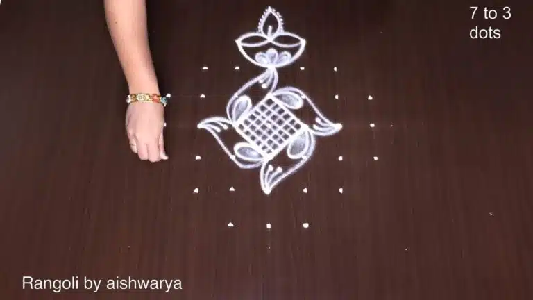 dotted diya rangoli