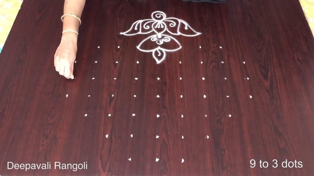 dotted diya rangoli