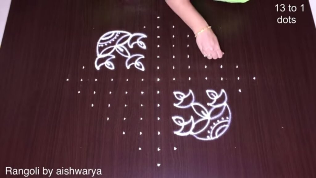 13×1 dots deepam rangoli