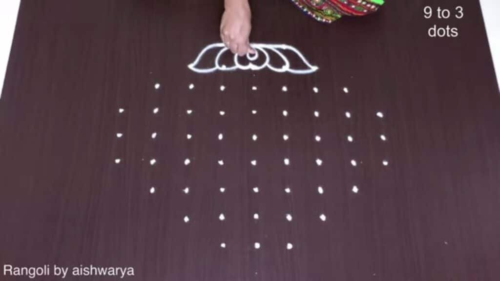 9×3 dots flower kolam
