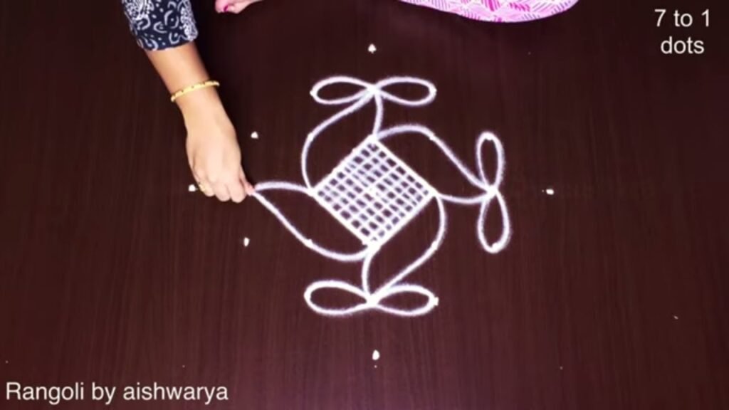 7 dots hand rangoli