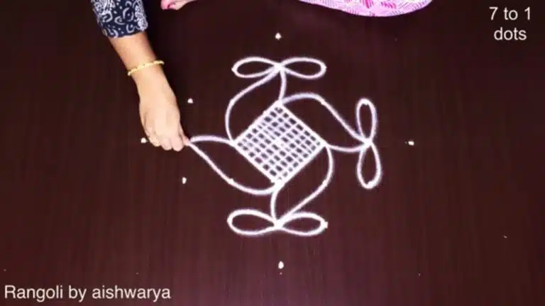 7 dots hand rangoli