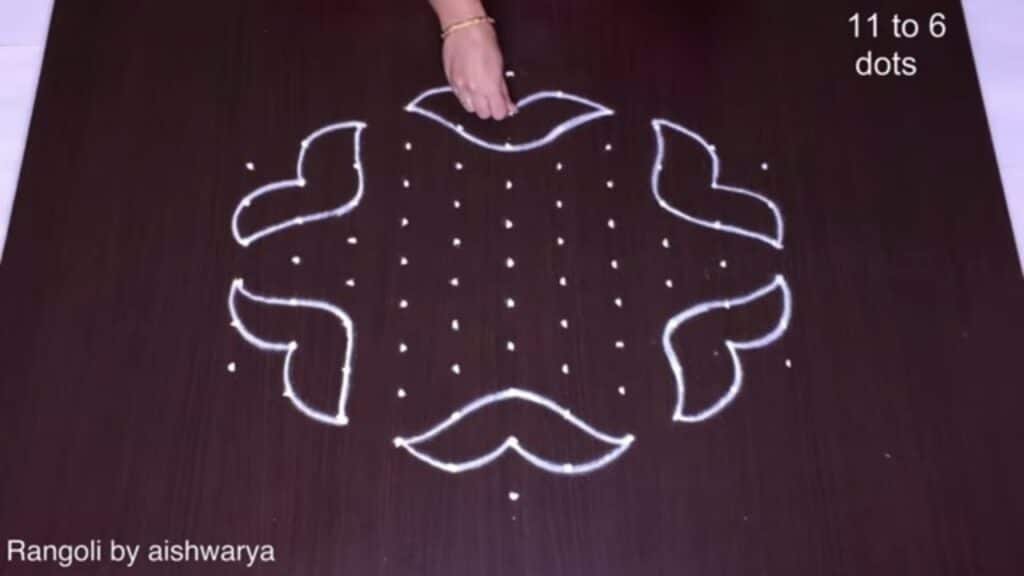 11×6 dots flower rangoli