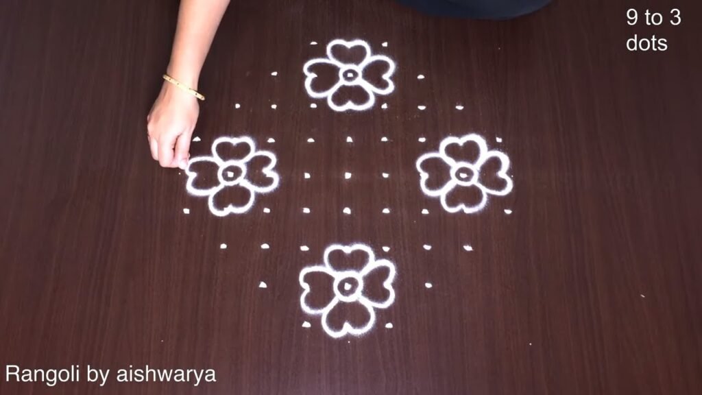 9×3×3 dots flower rangoli