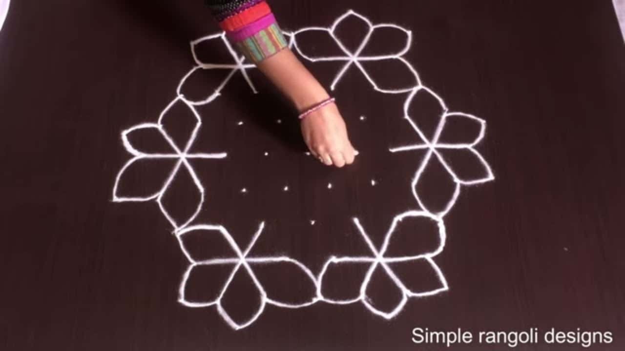 Flowers Rangoli Designs With 9 to 5
