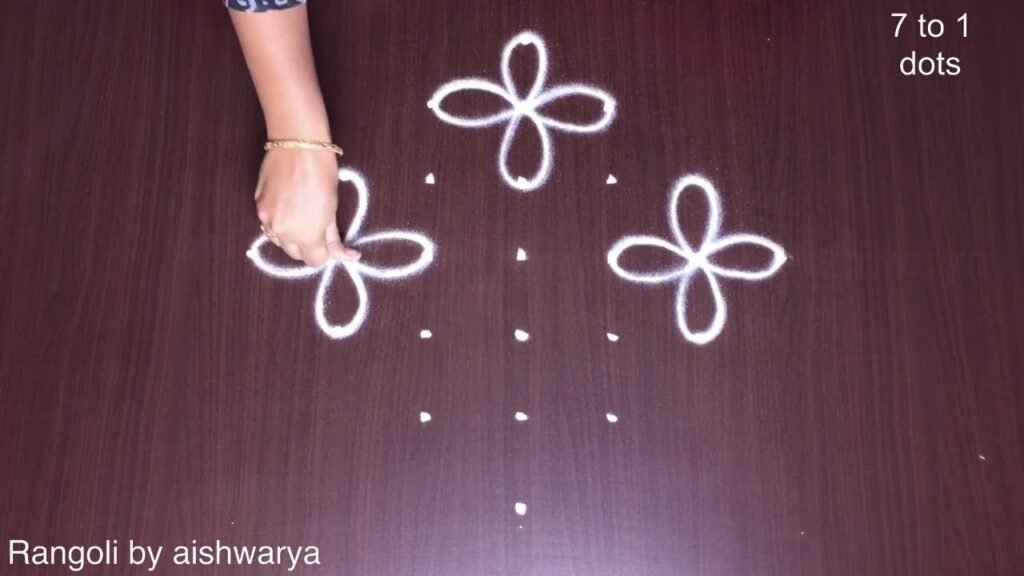 7×1 dots four-flower rangoli
