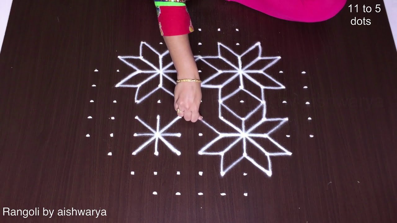 Muthyala Muggulu With 11 to 5 Dots Rangoli