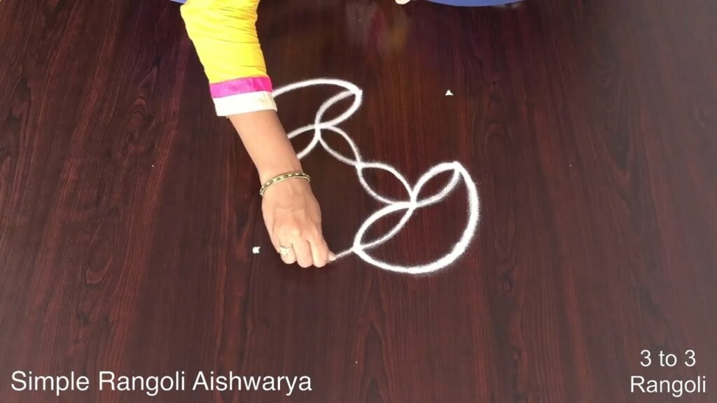 padi kolam with 3 dots