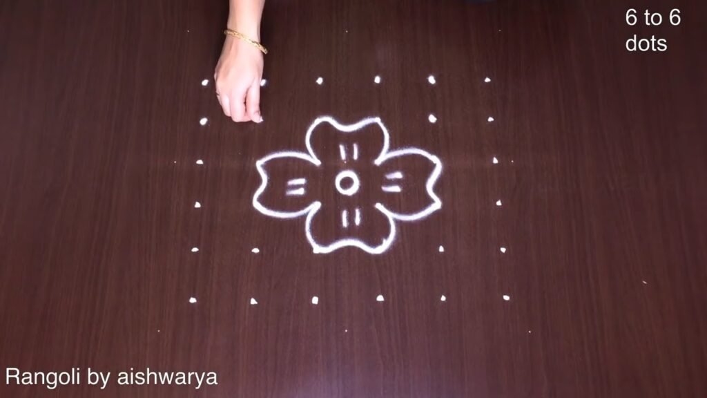 flower pulli varisai kolam