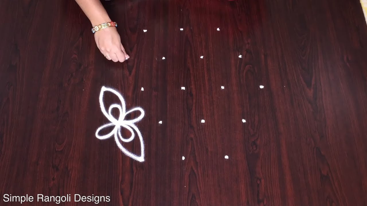 Rangoli With 5 to 3 Dots Latest