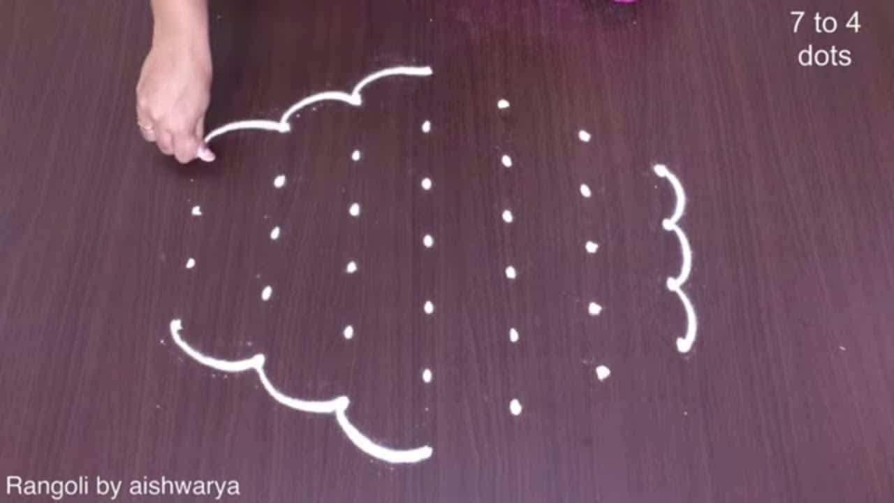 Simple 7 to 4 Dots Rangoli