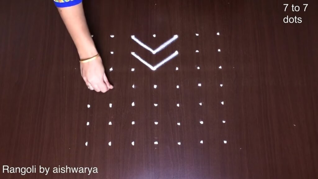 7 dots apartment diya rangoli
