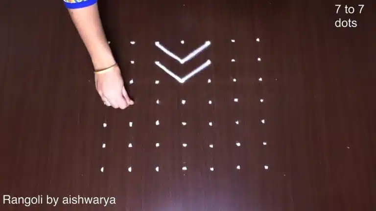 7 dots apartment diya rangoli