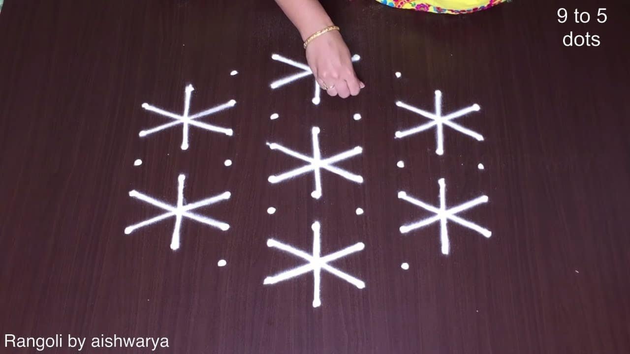 Simple Hand Rangoli Designs 9 Dots