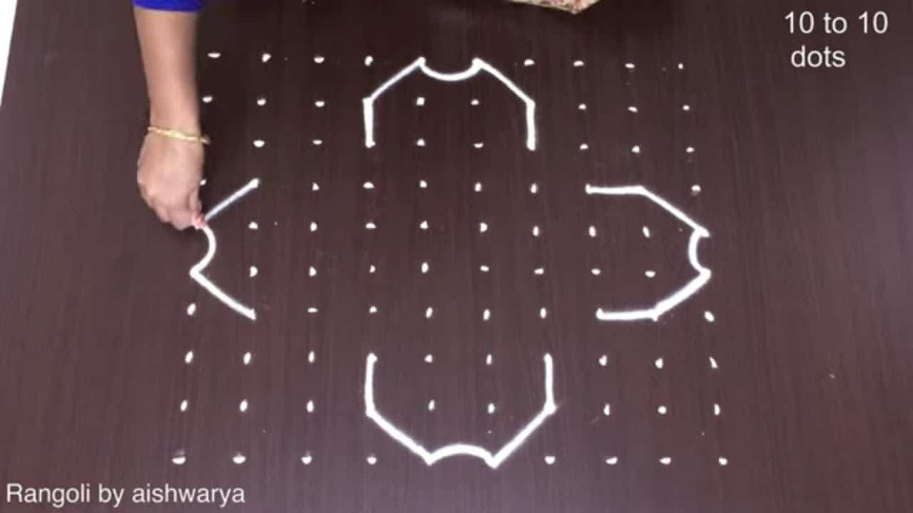 Simple Padi Rangoli With 10 Dots