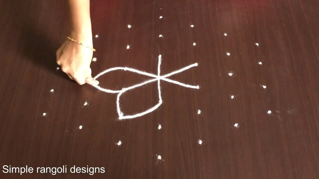 Simple Rangoli Design With 7-4 Dots