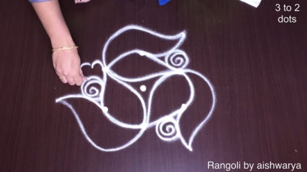 small rangoli on floor