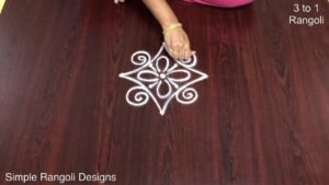 3 to 1 dots Rangoli Designs