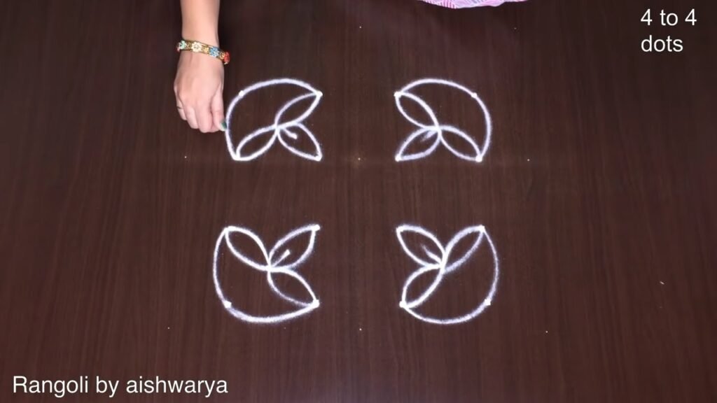 deepam kolam with 4 dots