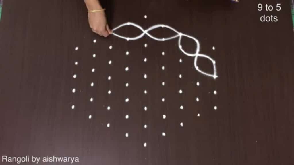 Sravanamasam Friday rangoli with 9 dots