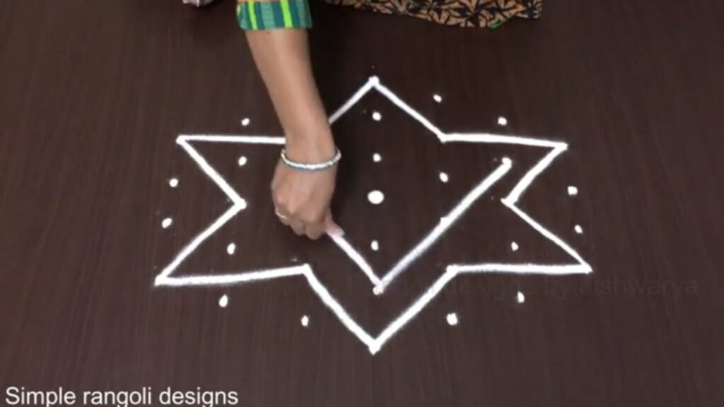 7-to-4 dot star kolam for Kartik Purnima