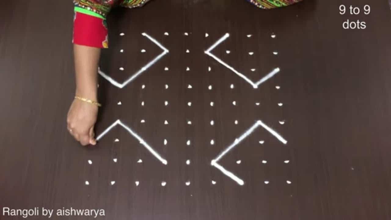 Traditional Kolam Rangoli With 9