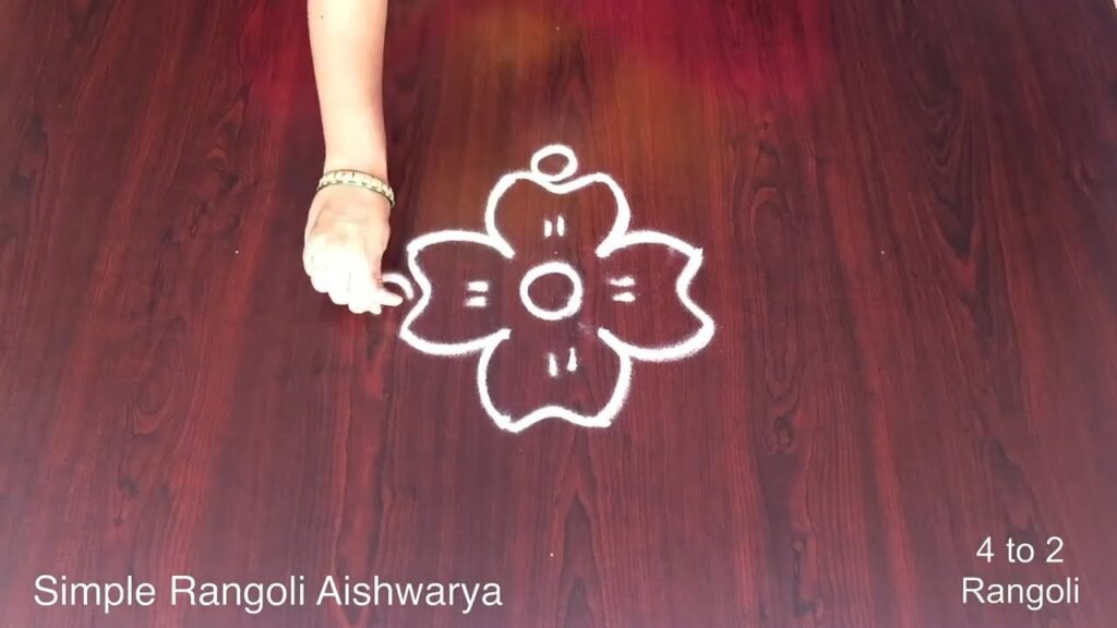 traditional rangoli with 4 dots