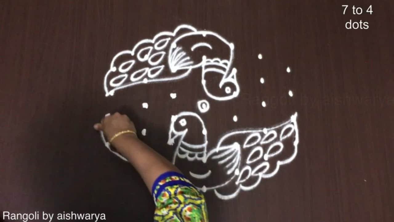 Two Diyas 7 by 4 Muggulu