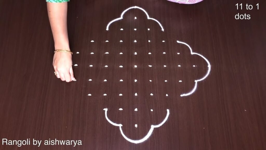 11×1 dots butterfly kolam