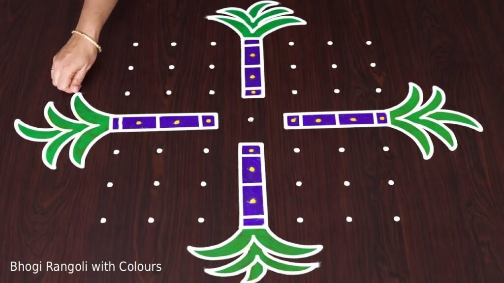 A colourful Bhogi harvest kolam — sugarcane motifs drawn in green and purple on a dot grid
